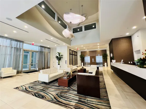 a view of a gym with gym equipment