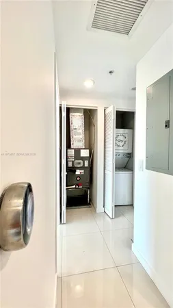 a kitchen with stainless steel appliances a refrigerator and a stove