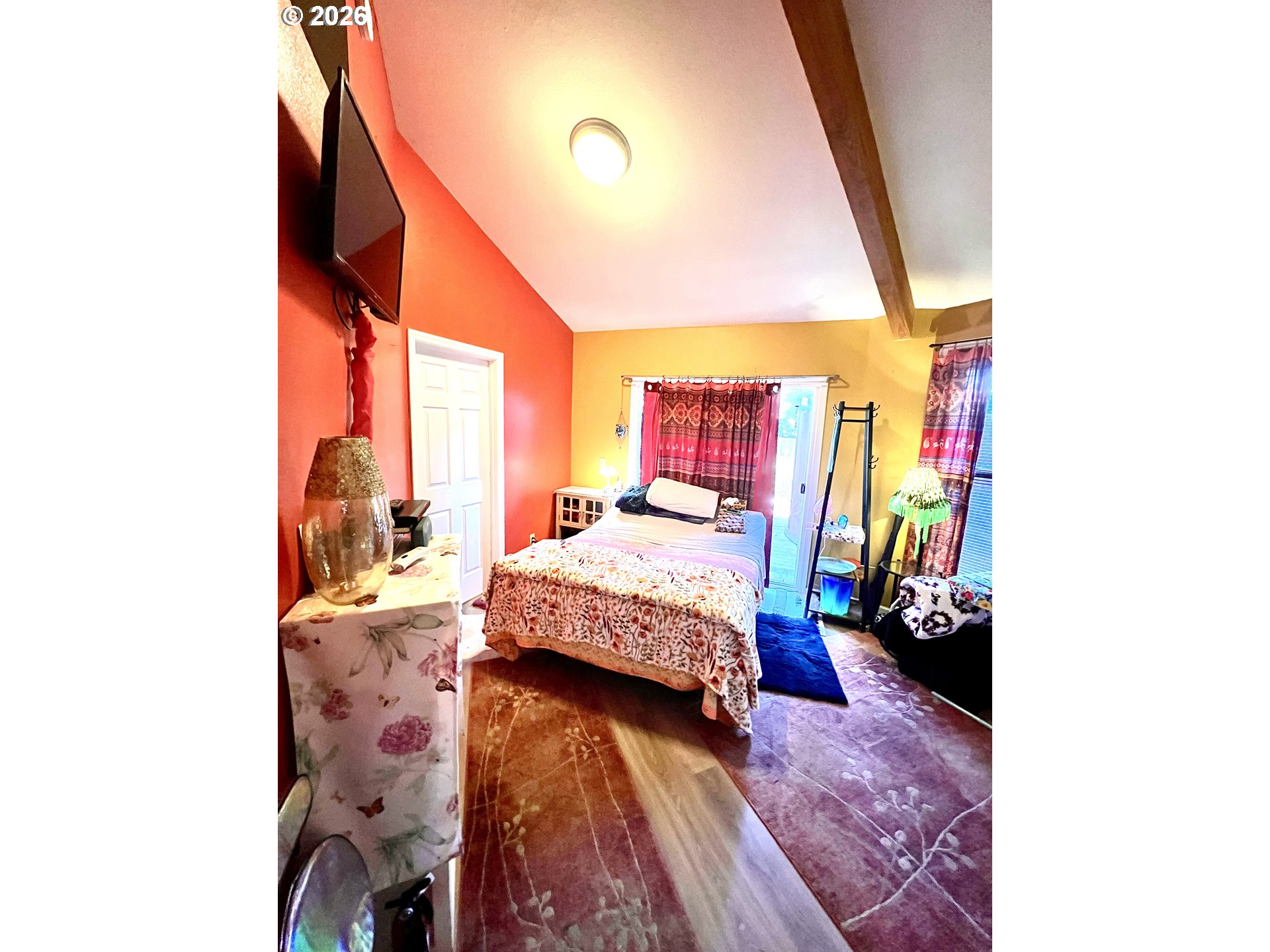 1625 Kristi Loop Lakeside, OR 97449 - Photo 16 of 41 a bedroom with a bed and a window