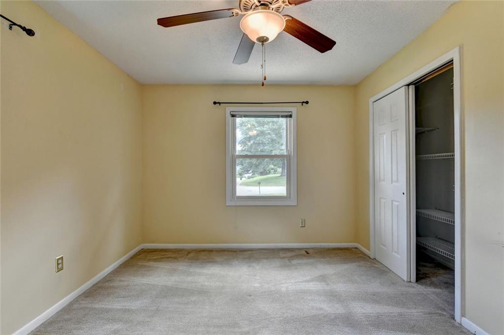 1577 Harbour Oaks Road Tucker, GA 30084 - Photo 34 of 58 a view of an empty room with a window
