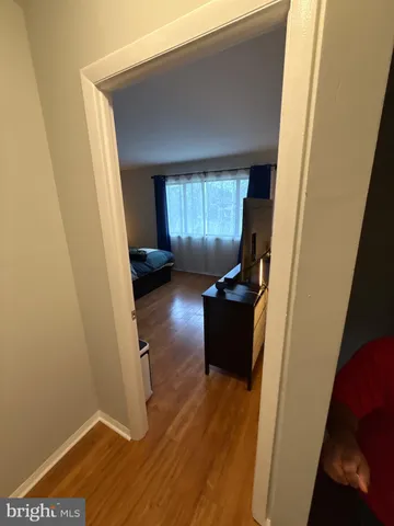 a view of a livingroom with wooden floor