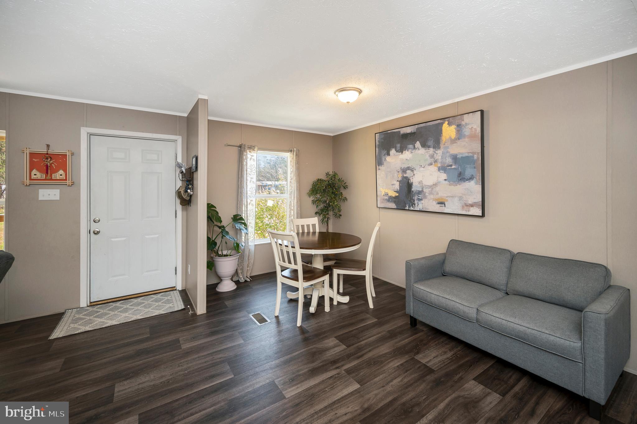 5120 Burr Hill Road Rhoadesville, VA 22542 - Photo 8 of 45 a living room with furniture and a wooden floor