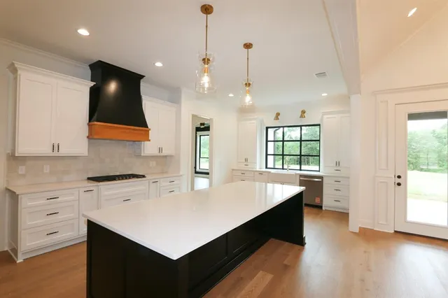 a view of cabinets and window