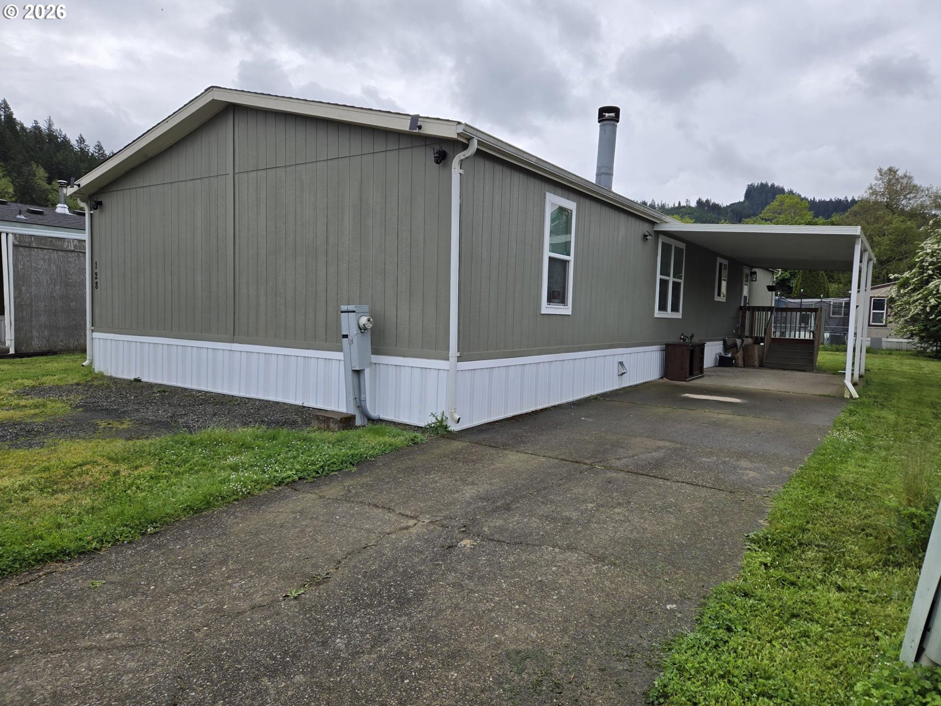 a house with yard in front of it
