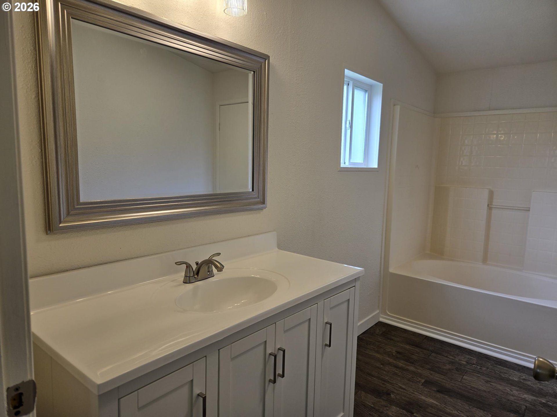 550 South State Street Sutherlin, OR 97479 - Photo 6 of 10 a bathroom with a sink and a mirror