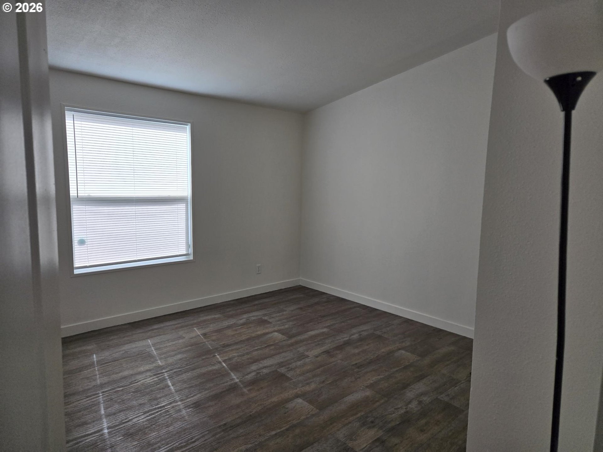 550 South State Street Sutherlin, OR 97479 - Photo 7 of 10 an empty room with a window