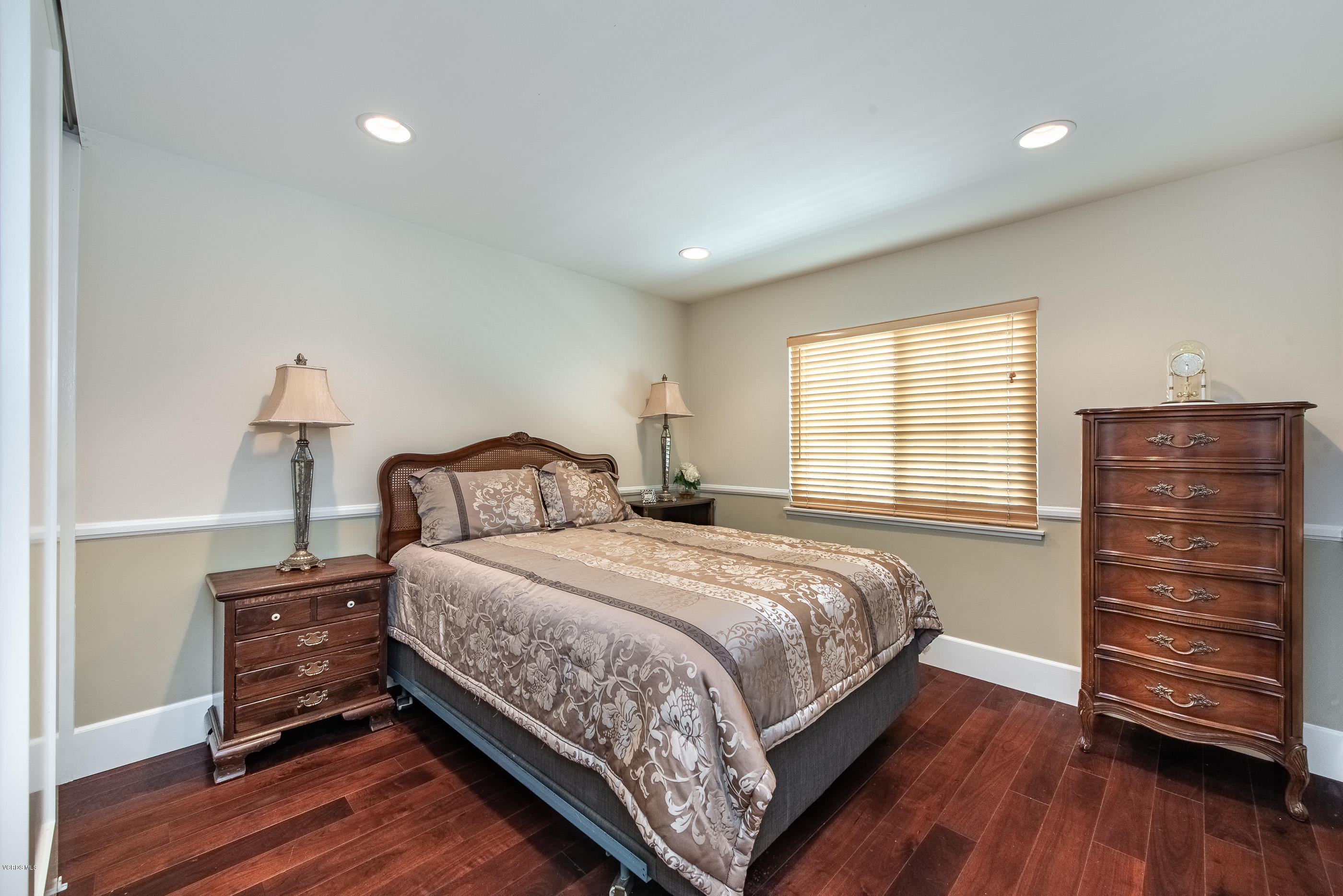 665 Azalea Street Thousand Oaks, CA 91360 - Photo 15 of 52 a bedroom with bed a dresser and wooden floor