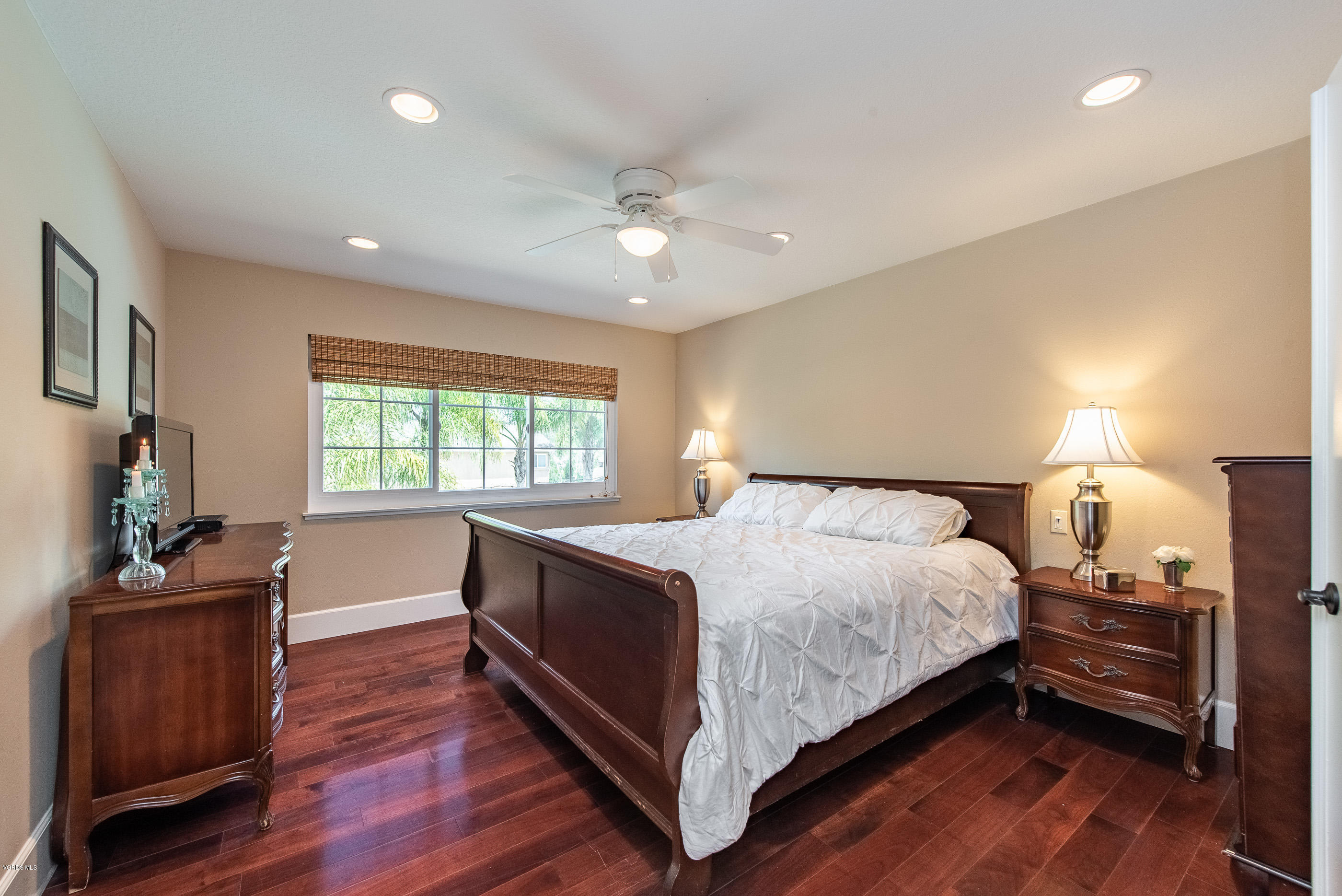 665 Azalea Street Thousand Oaks, CA 91360 - Photo 17 of 52 a bedroom with a bed and wooden floor