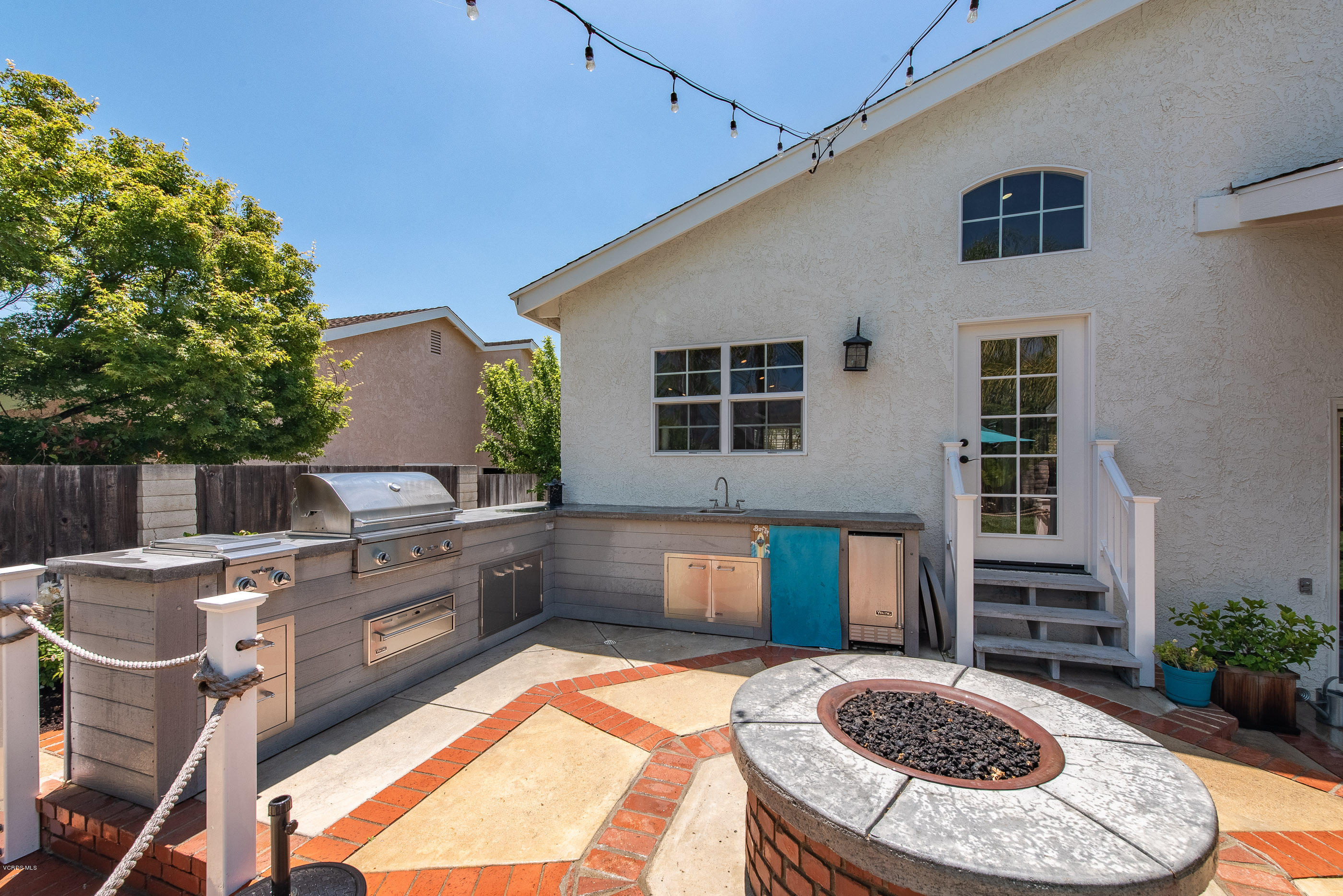 665 Azalea Street Thousand Oaks, CA 91360 - Photo 24 of 52 a kitchen with a sink stove and refrigerator