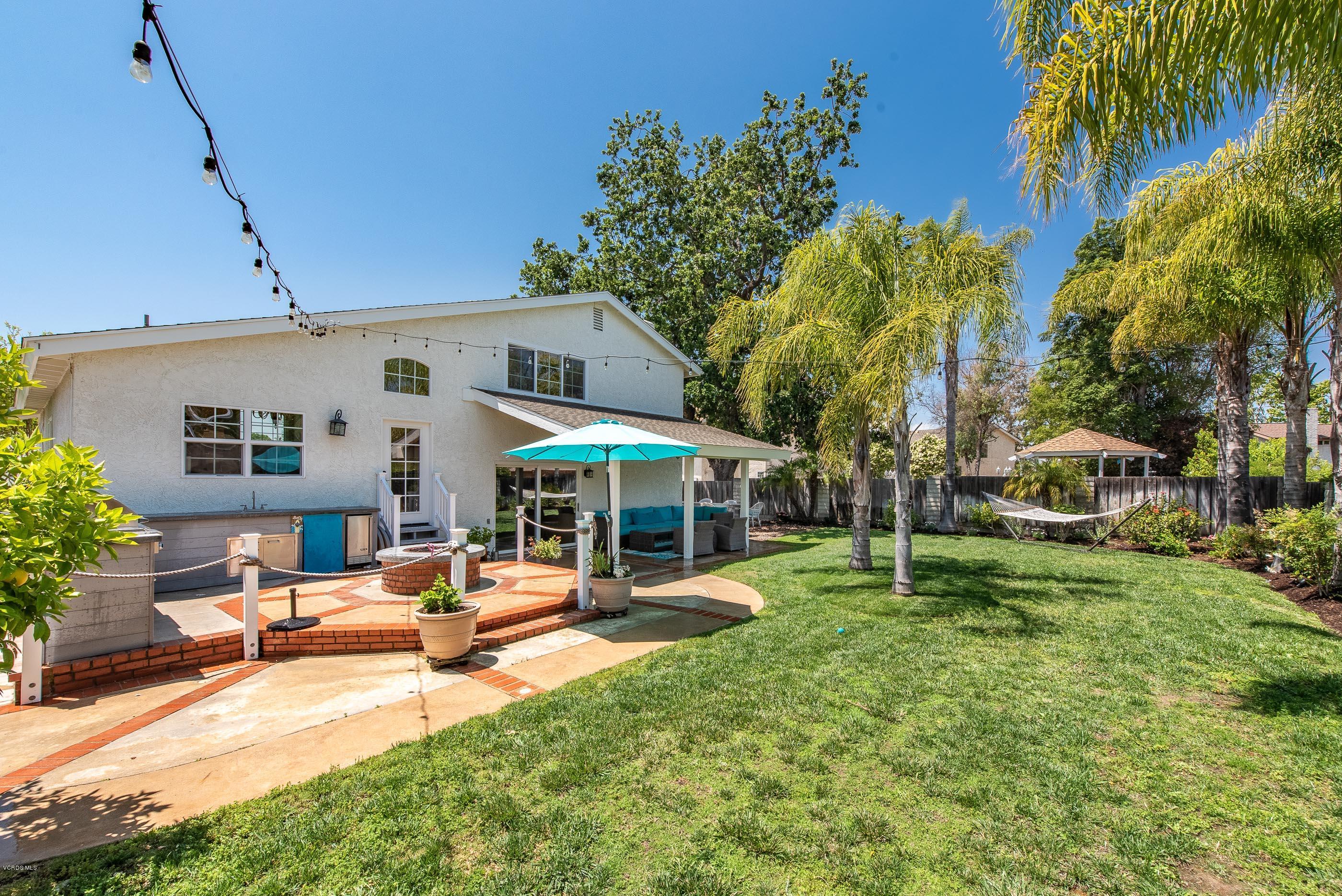 665 Azalea Street Thousand Oaks, CA 91360 - Photo 26 of 52 a view of a house with a yard porch and sitting area