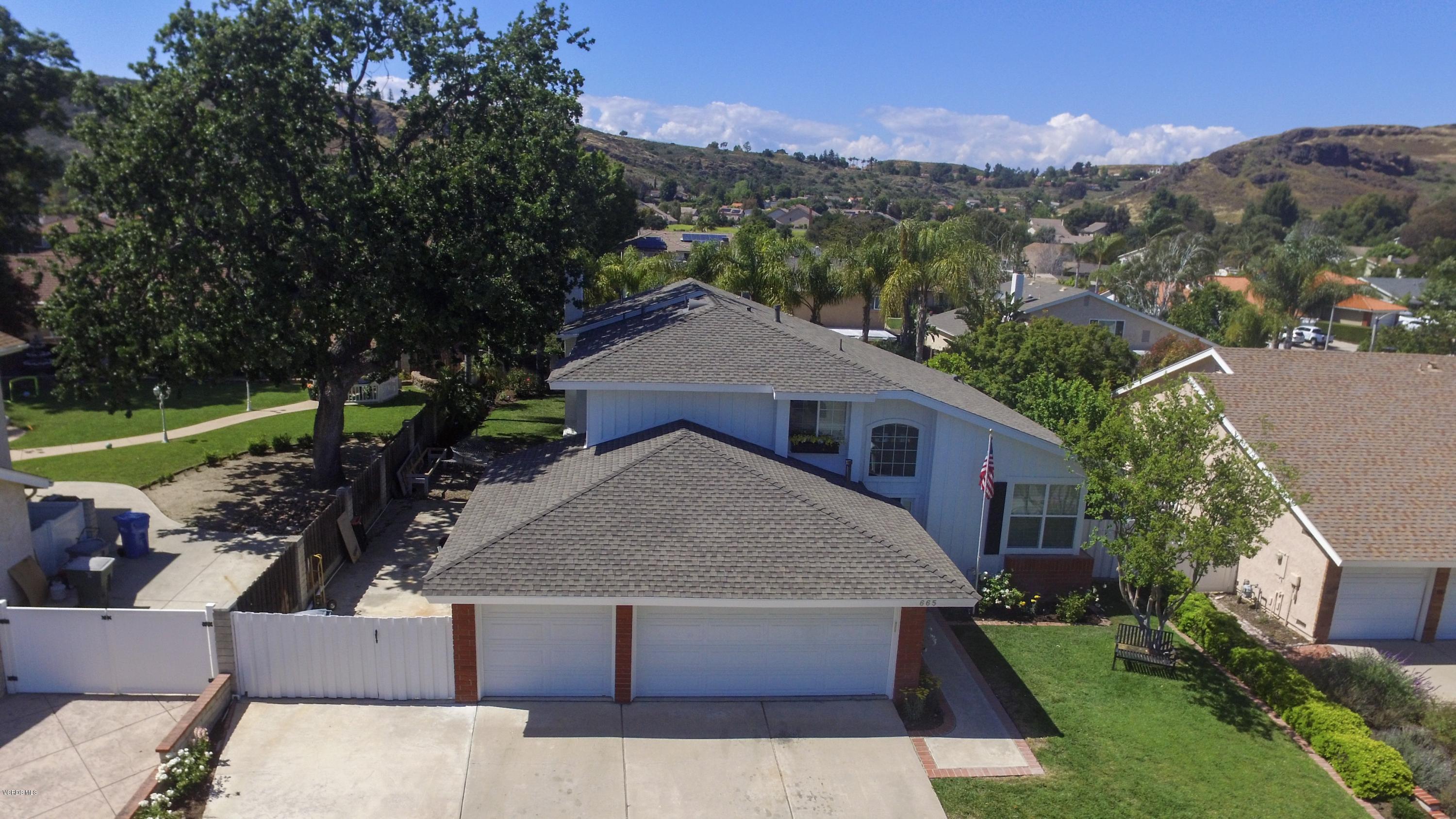 665 Azalea Street Thousand Oaks, CA 91360 - Photo 37 of 52 an aerial view of a house with a yard