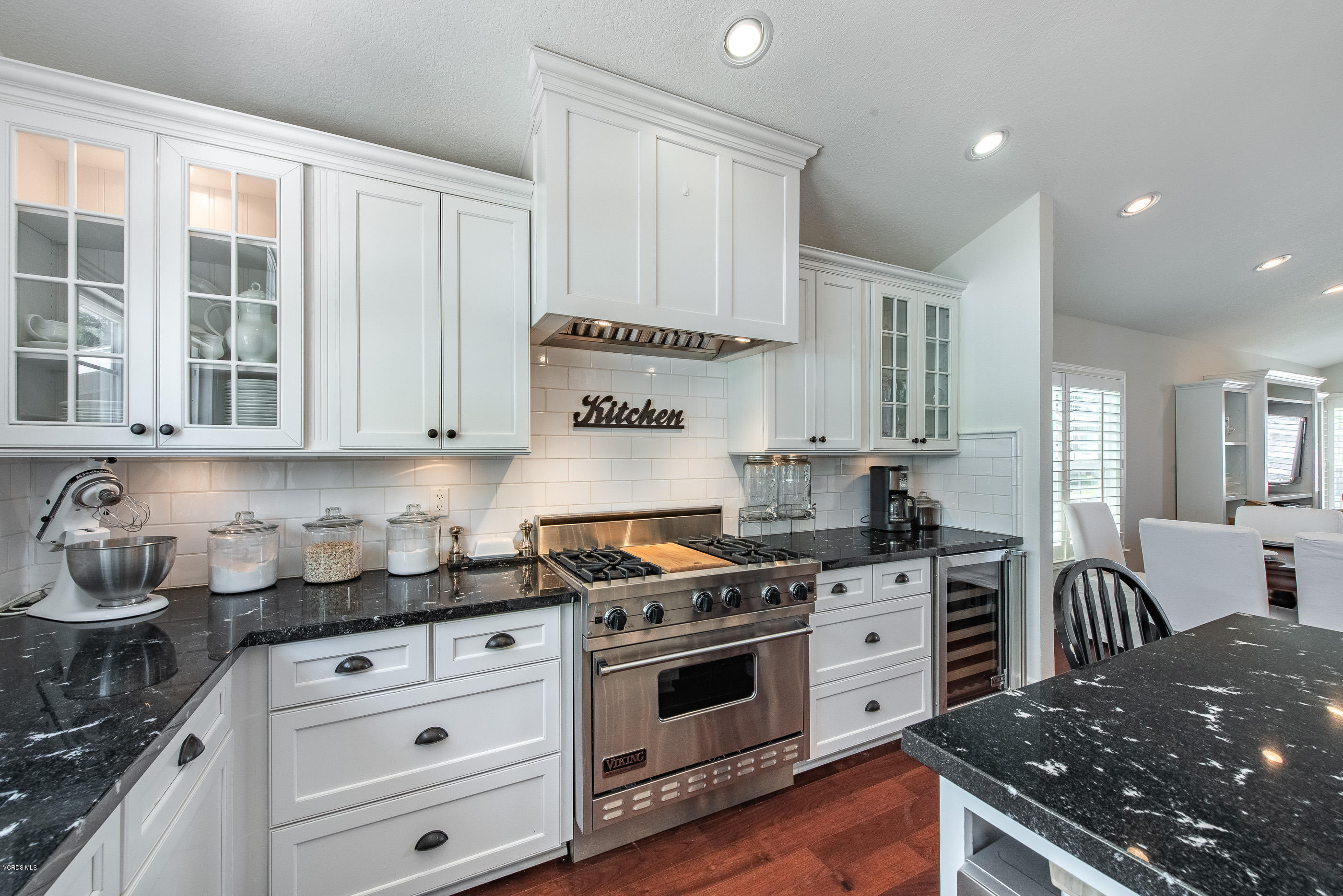 665 Azalea Street Thousand Oaks, CA 91360 - Photo 7 of 52 a kitchen with granite countertop a stove a sink and a refrigerator