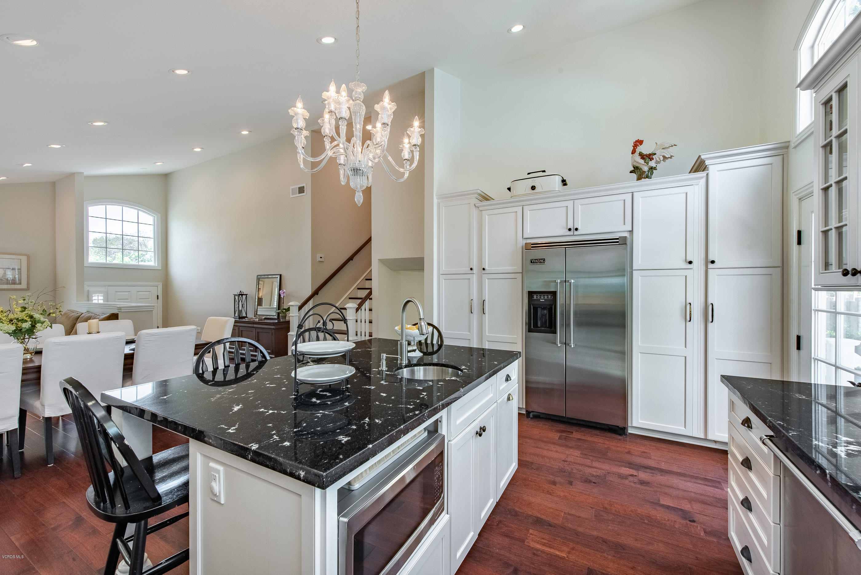 665 Azalea Street Thousand Oaks, CA 91360 - Photo 9 of 52 a kitchen with stainless steel appliances granite countertop a sink a stove a refrigerator and island