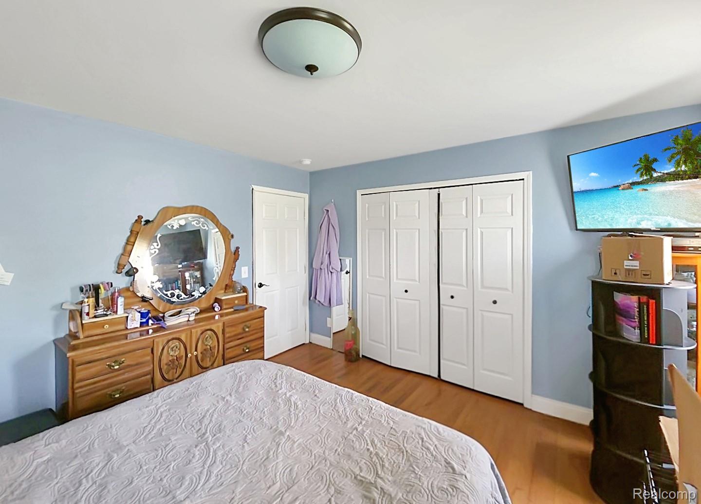 6533 Kilburn Road Jeddo, MI 48032 - Photo 14 of 19 Bedroom with light wood finished floors and a closet