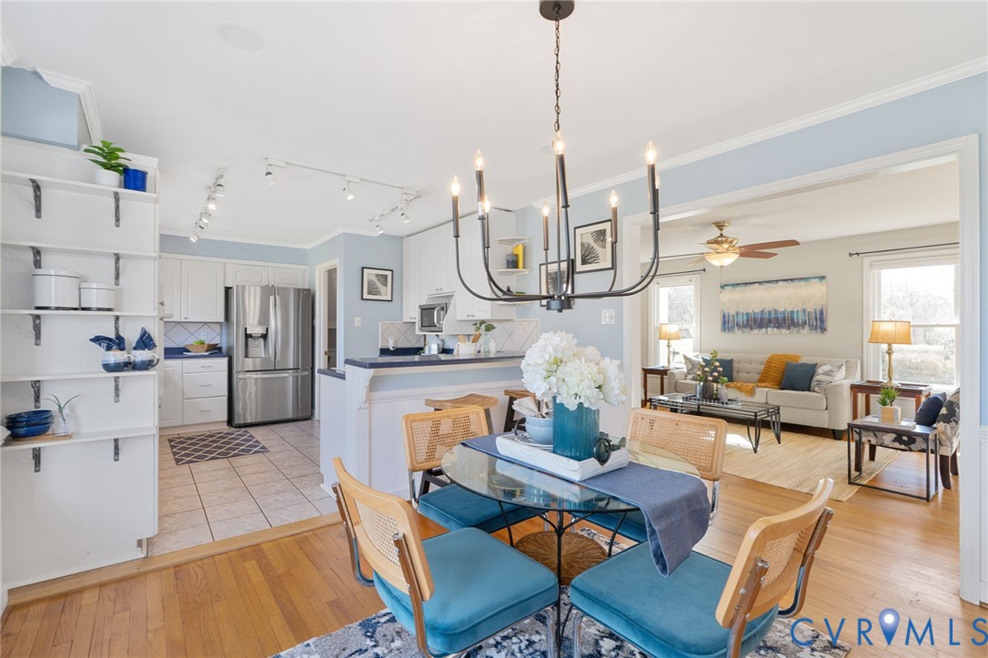 12216 Mt Hermon Road Ashland, VA 23005 - Photo 15 of 49 Dining room featuring a chandelier, crown molding,