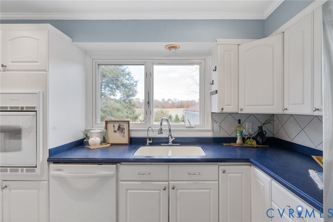 12216 Mt Hermon Road Ashland, VA 23005 - Photo 22 of 49 Kitchen with casement windows overlooking the spac