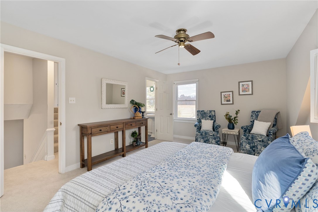 12216 Mt Hermon Road Ashland, VA 23005 - Photo 25 of 49 Primary bedroom with walk in closet, eve attic sto