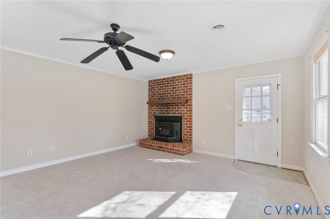 12216 Mt Hermon Road Ashland, VA 23005 - Photo 36 of 49 Large family room with masonry fireplace with wood