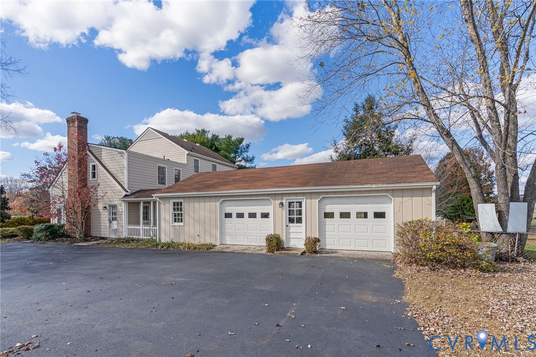 12216 Mt Hermon Road Ashland, VA 23005 - Photo 42 of 49 40' double bay garage with garage door opener and