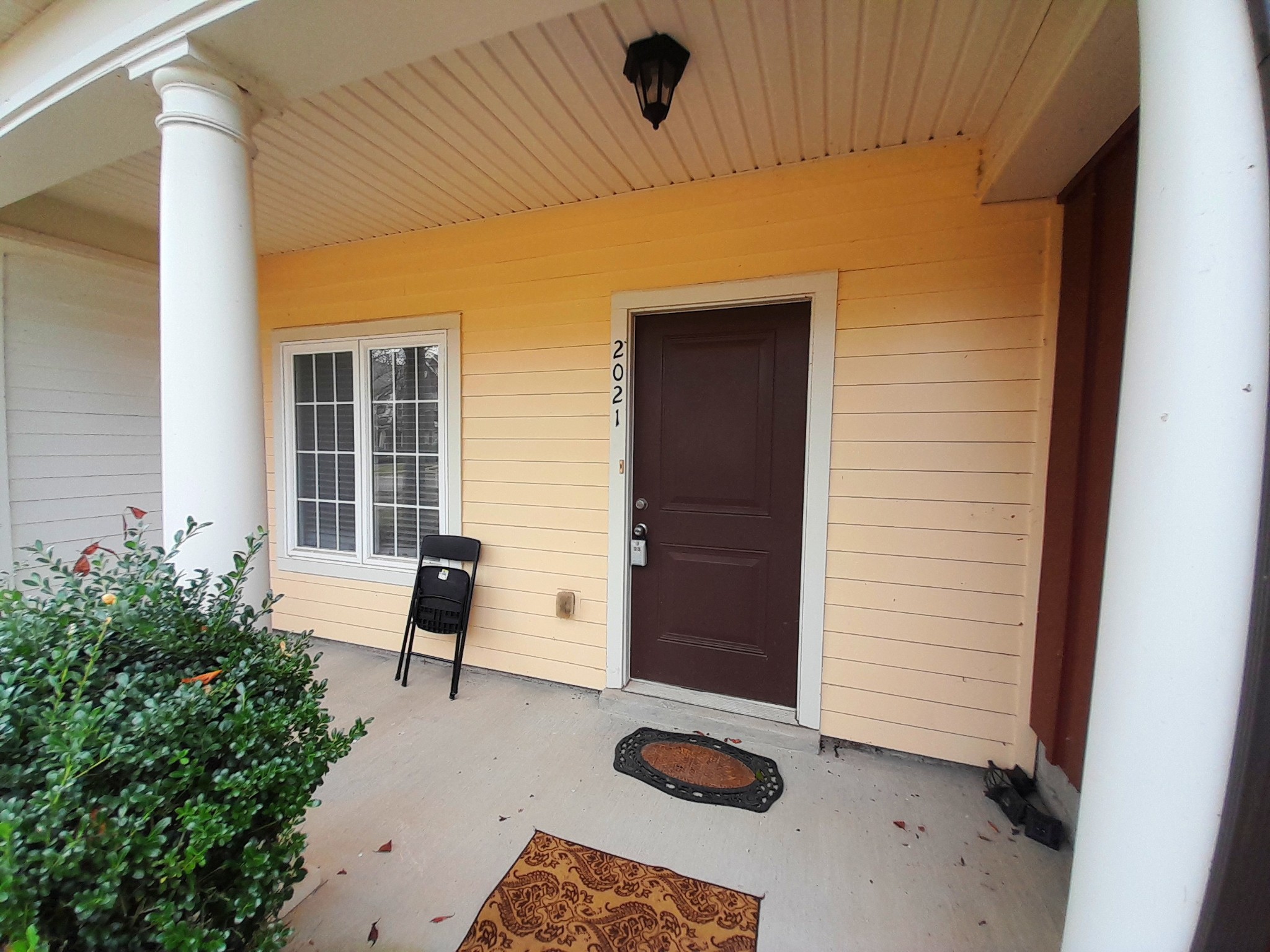 2021 Hemlock Drive Spring Hill, TN 37174 - Photo 7 of 15 a patio with table and chairs and potted plants