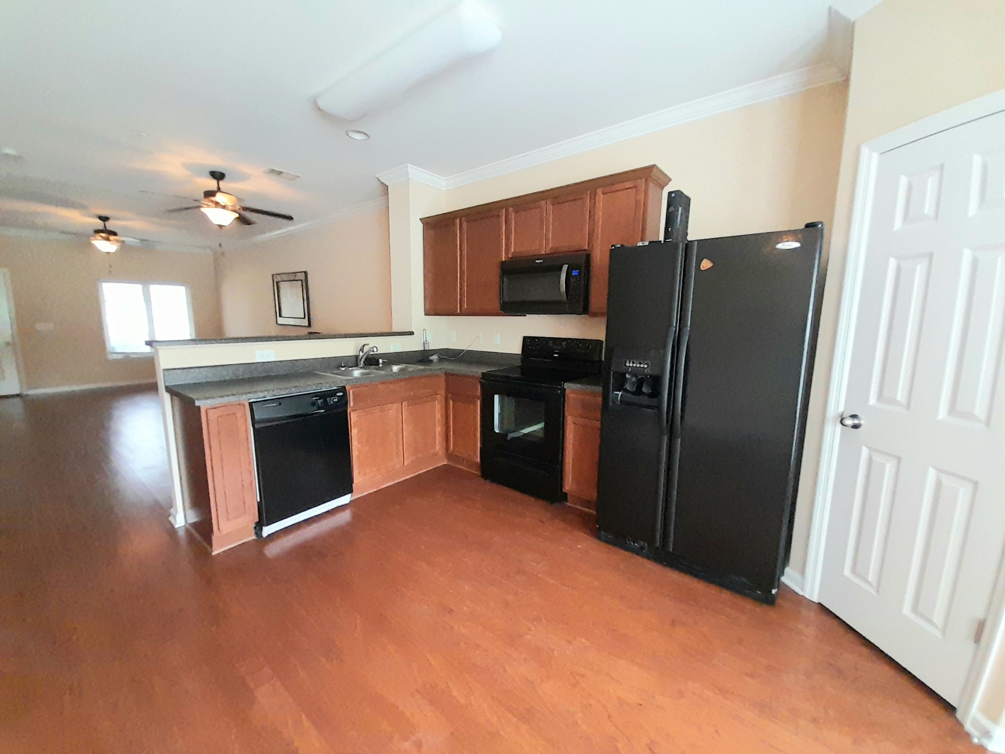 2021 Hemlock Drive Spring Hill, TN 37174 - Photo 9 of 15 a kitchen with stainless steel appliances granite countertop a stove refrigerator and microwave
