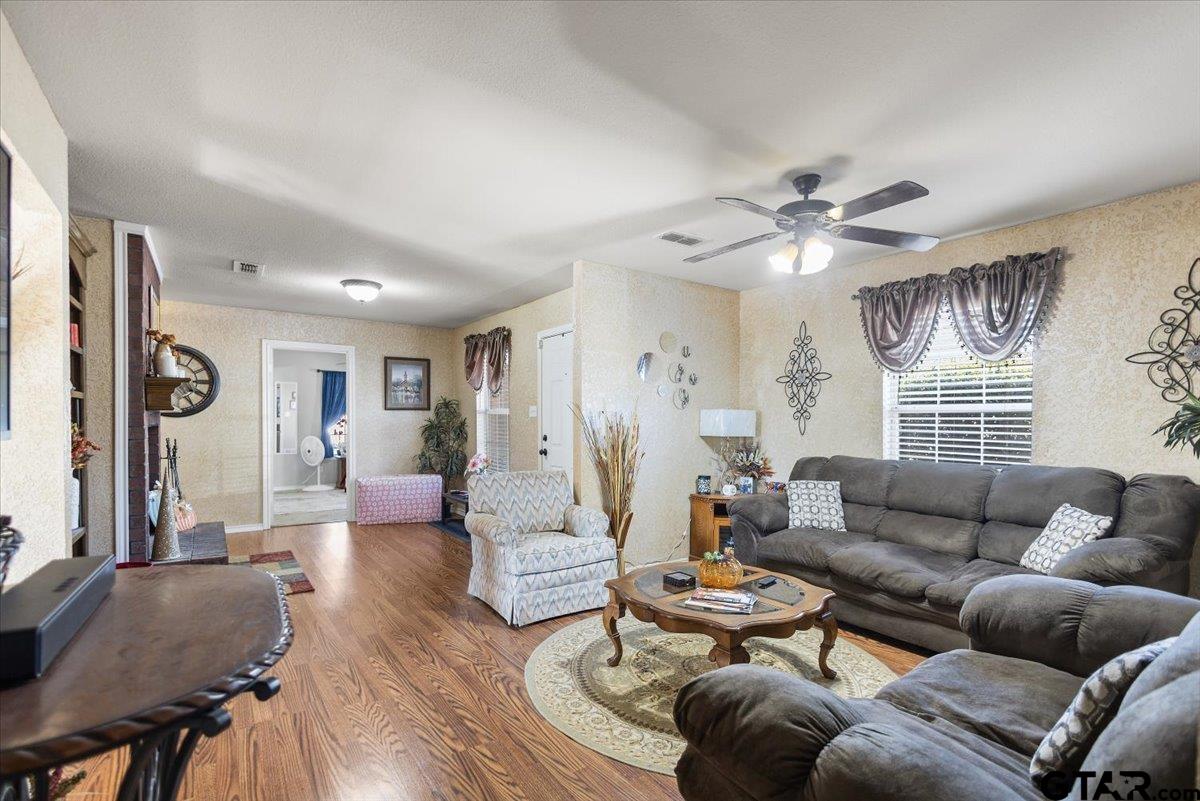 14716 Fox Ridge Tyler, TX 75709 - Photo 6 of 25 a living room with furniture and a large window