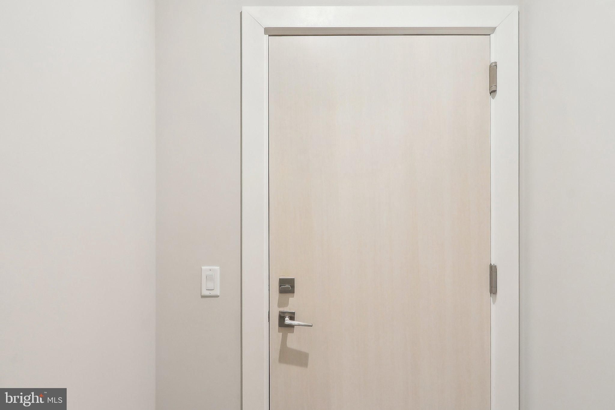 88 V Street Southwest, Unit 311 Washington, DC 20024 - Photo 13 of 32 a bathroom with a glass shower door