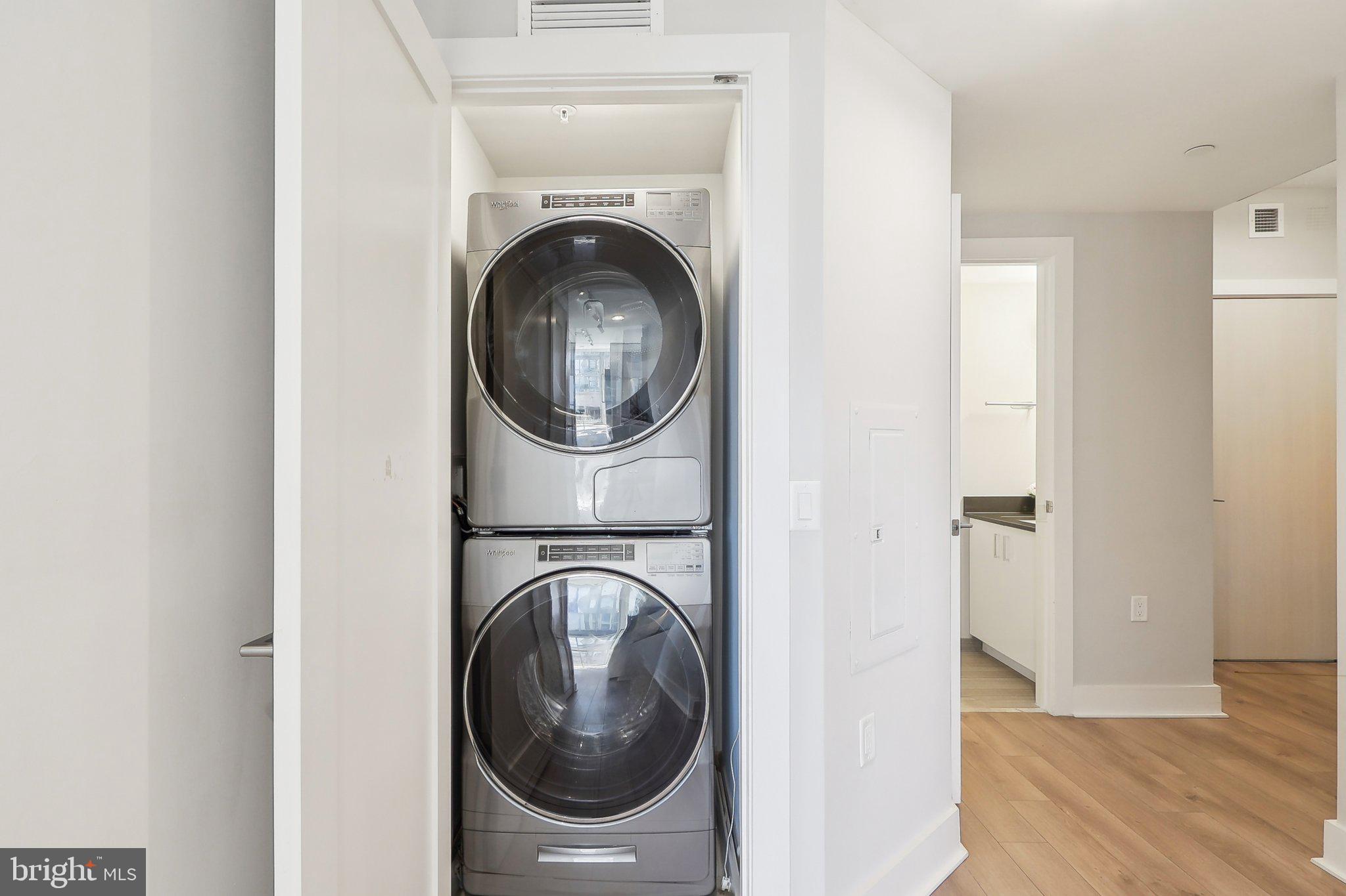 88 V Street Southwest, Unit 311 Washington, DC 20024 - Photo 17 of 32 a close view of a utility room with dryer and washer