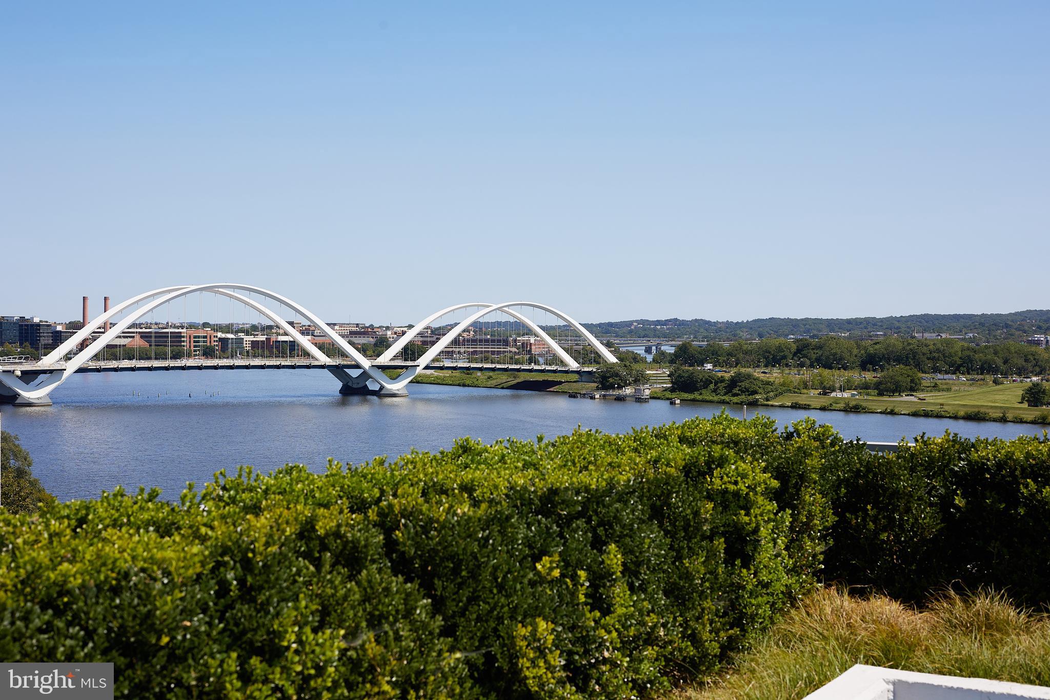 88 V Street Southwest, Unit 311 Washington, DC 20024 - Photo 29 of 32 a front view of a house with a yard