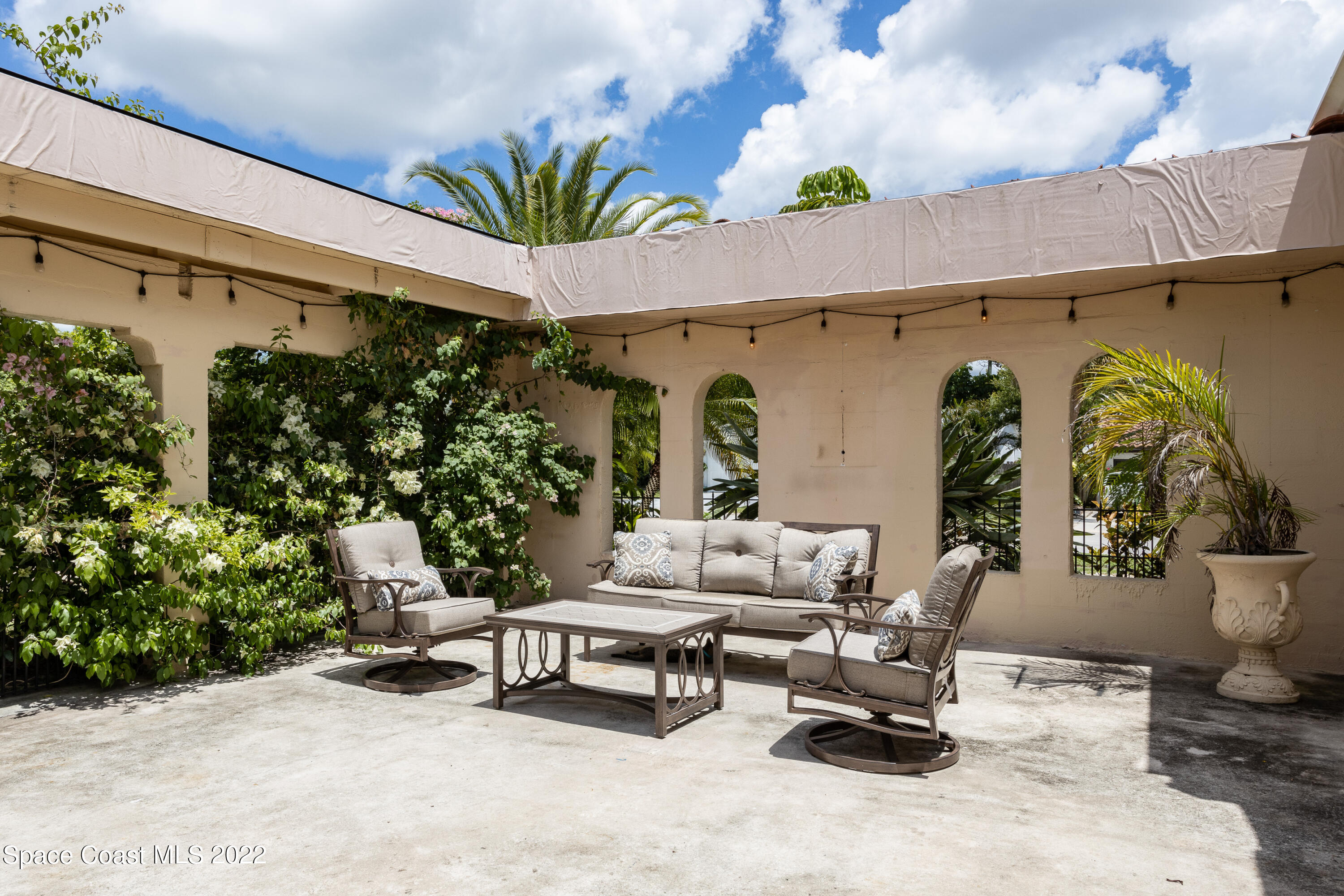 115 Valencia Road Rockledge, FL 32955 - Photo 31 of 36 Courtyard-Style Outdoor Living Area