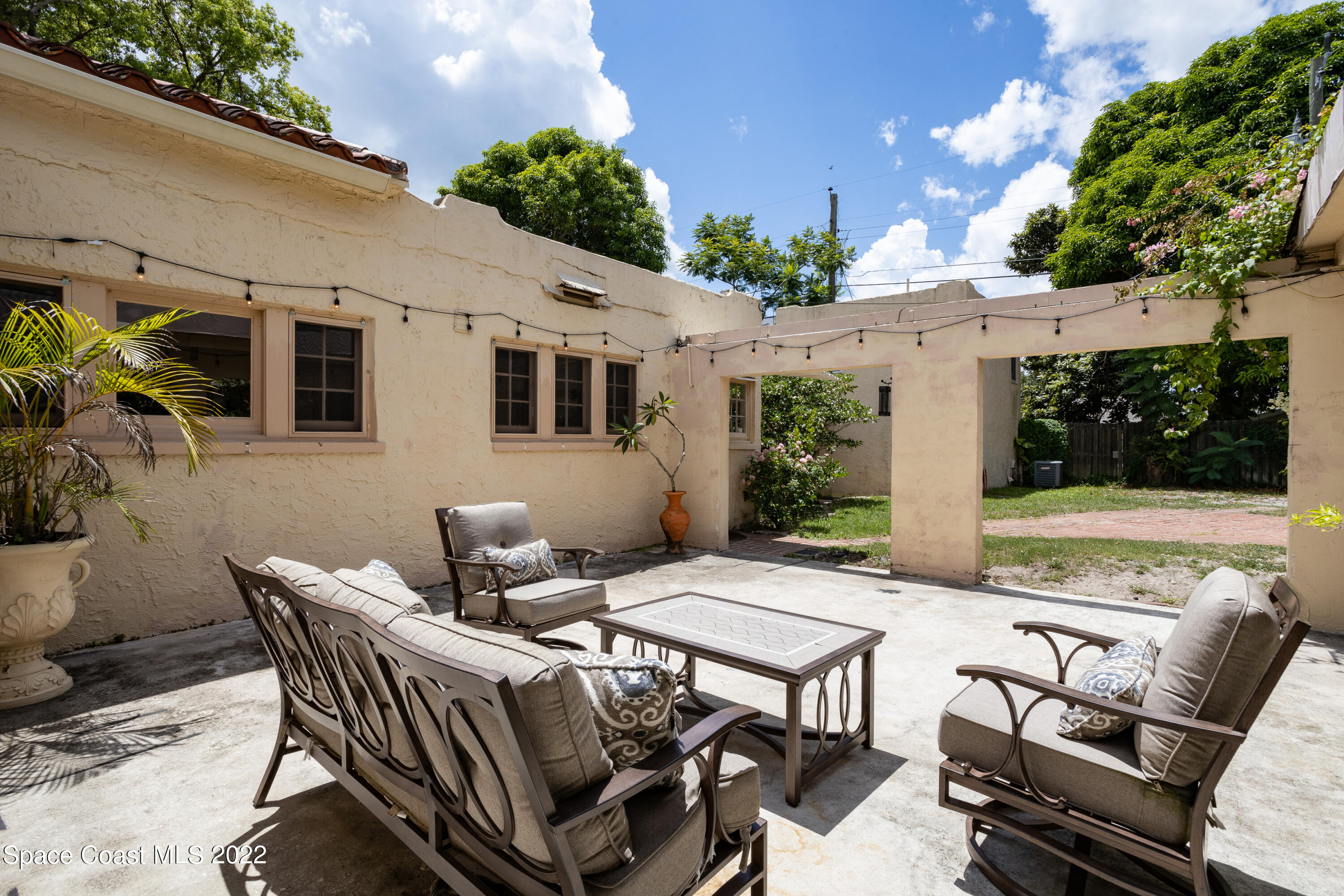 115 Valencia Road Rockledge, FL 32955 - Photo 32 of 36 Courtyard-Style Outdoor Living Area