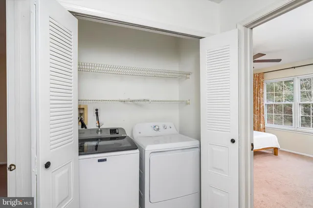 a view of utility room and washer and dryer