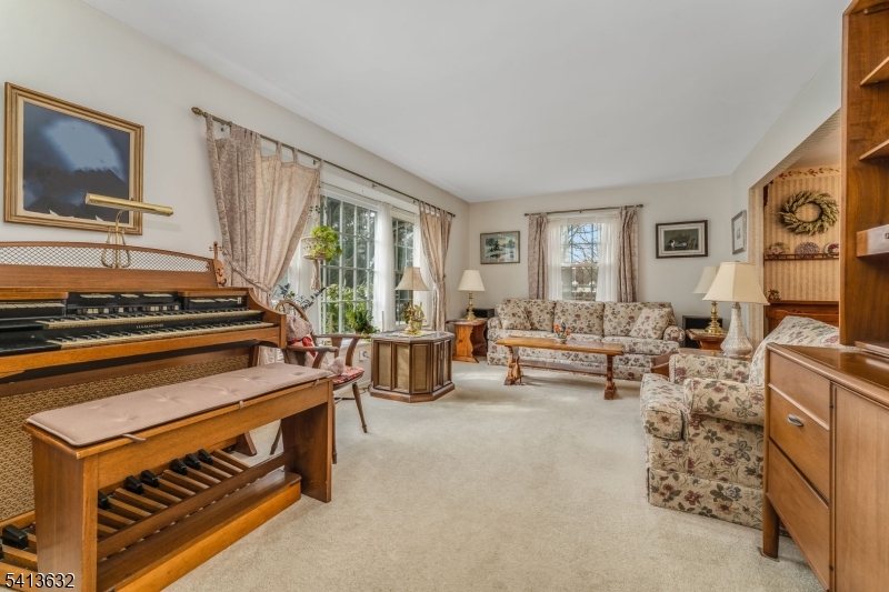 14 Ramsey Road Lebanon, NJ 08833 - Photo 12 of 47 a living room with furniture and a fireplace