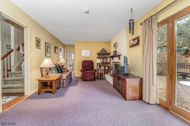 14 Ramsey Road Lebanon, NJ 08833 - Photo 25 of 47 a view of living room with furniture and chandelier