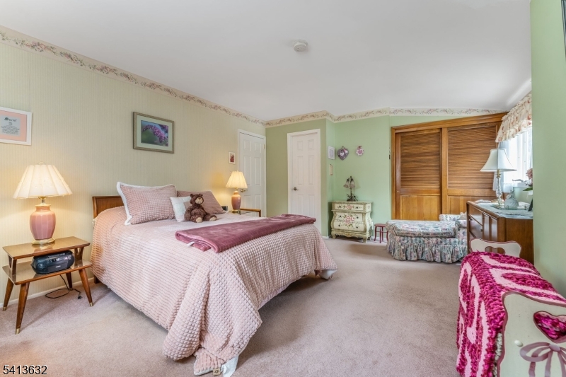 14 Ramsey Road Lebanon, NJ 08833 - Photo 27 of 47 a bedroom with bed and a couch