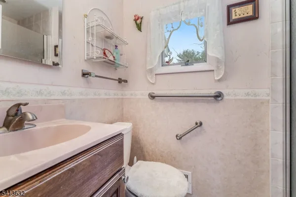 a bathroom with a sink and a toilet