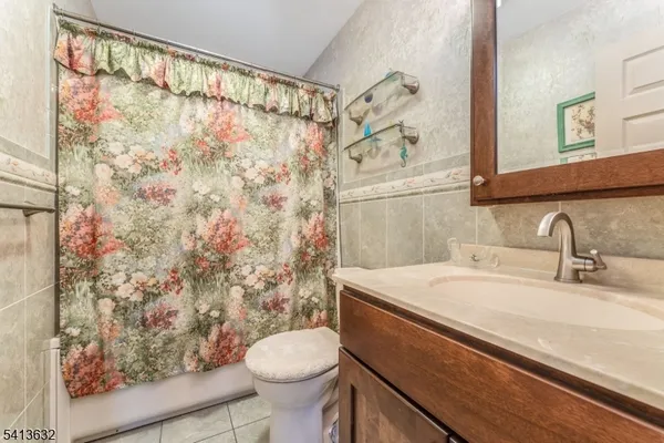 a bathroom with a sink and toilet