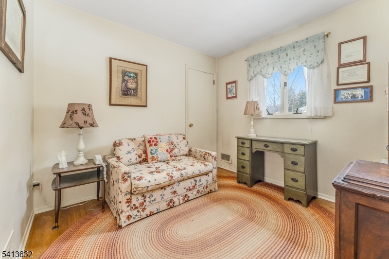 14 Ramsey Road Lebanon, NJ 08833 - Photo 32 of 47 a bedroom with a bed and a couch