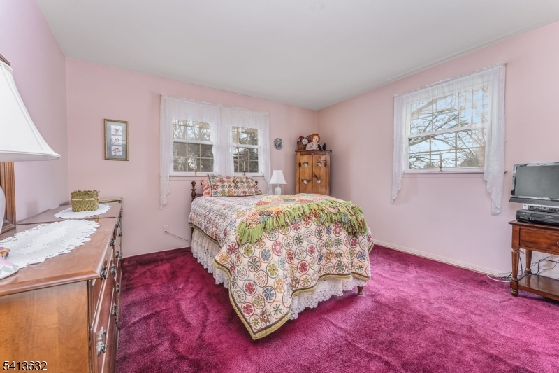 14 Ramsey Road Lebanon, NJ 08833 - Photo 34 of 47 a bedroom with a bed and a desk