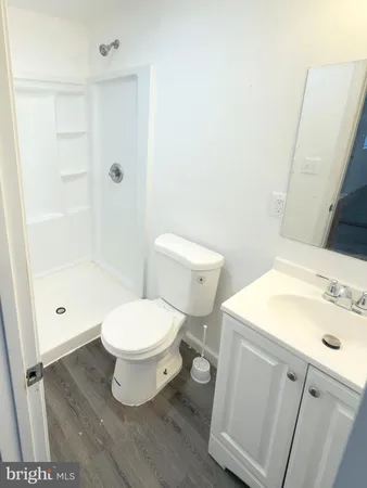 a bathroom with a toilet and a sink
