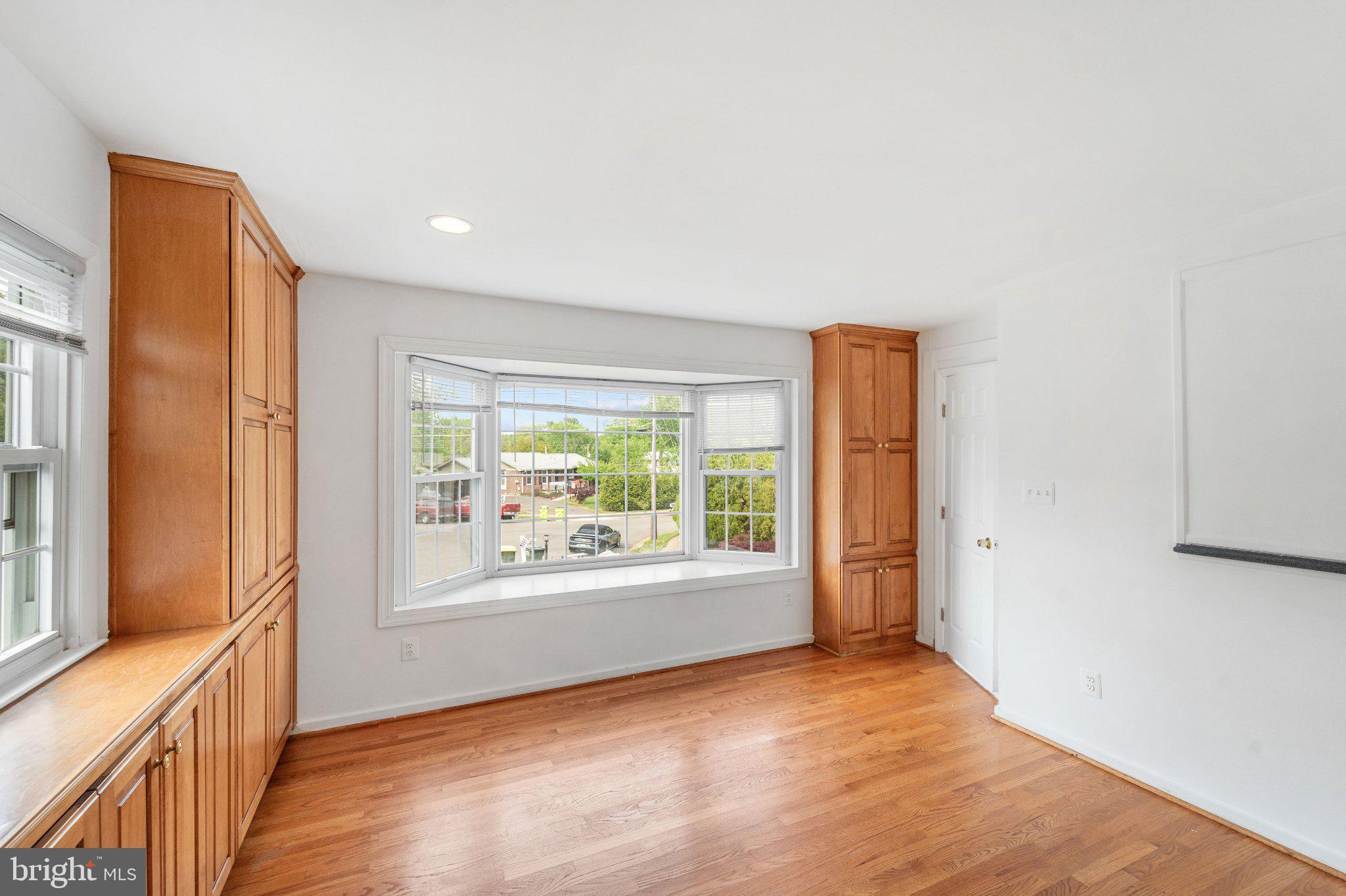 6423 Cabell Court Springfield, VA 22150 - Photo 15 of 58 a view of an empty room with a window