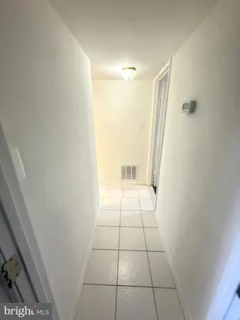 a bathroom with a vanity and a shower