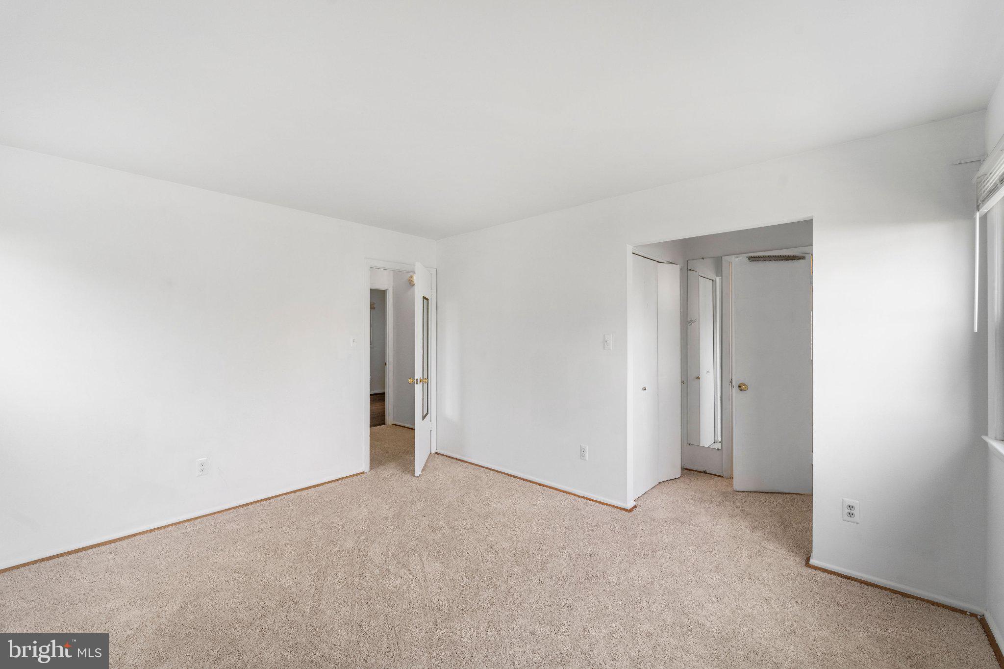 6423 Cabell Court Springfield, VA 22150 - Photo 23 of 58 a view of an empty room and closet area