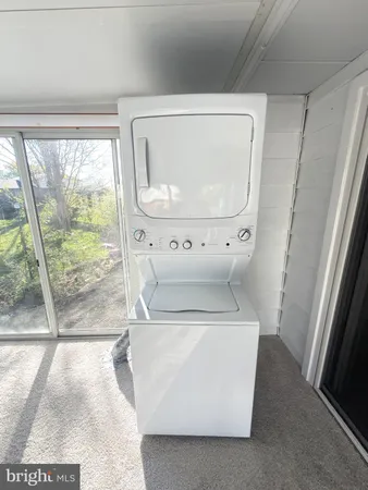 a view of a floor to ceiling window and a city view