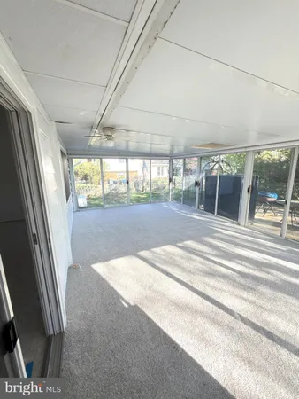 a view of a hallway with a couch