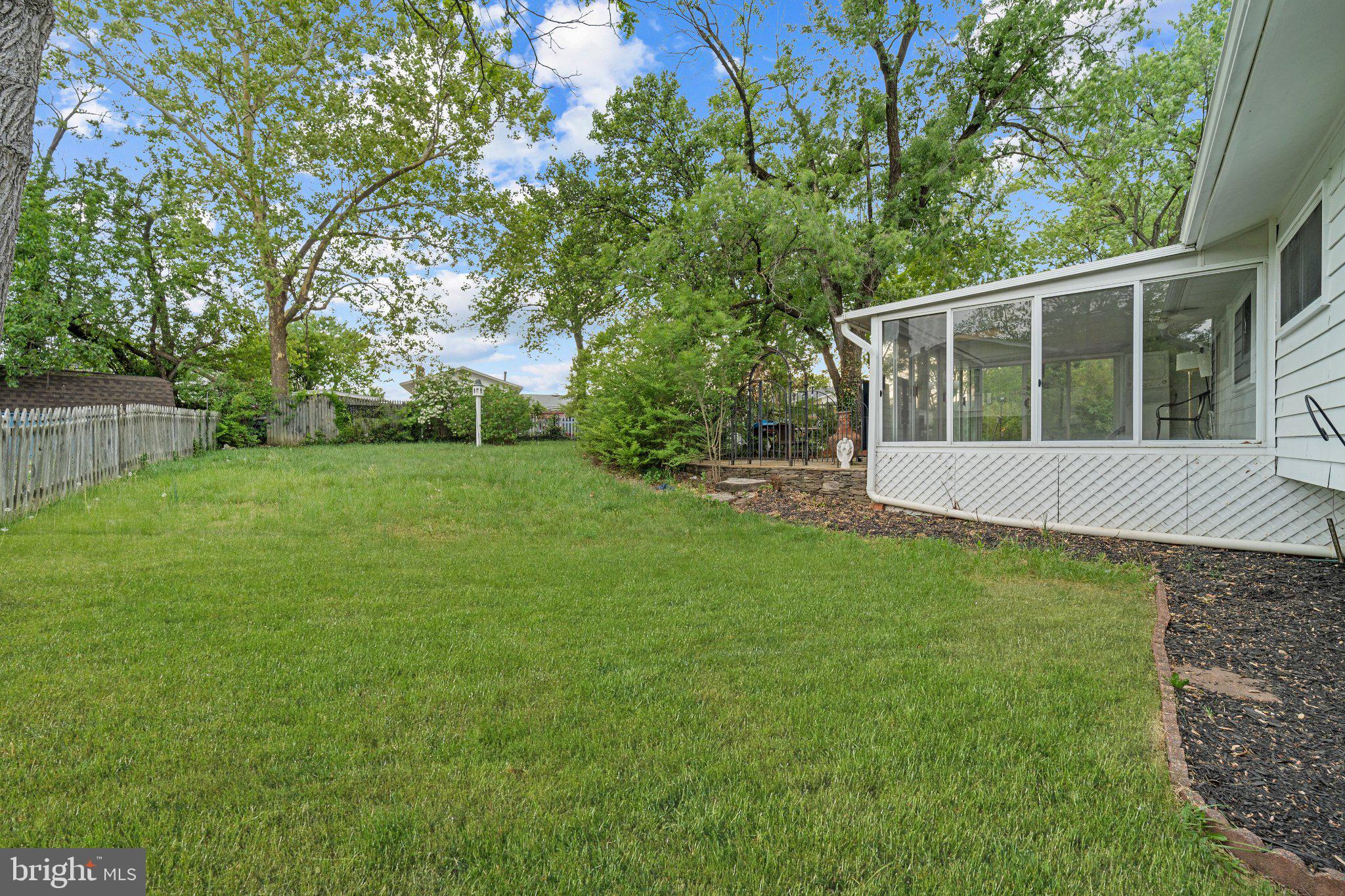 6423 Cabell Court Springfield, VA 22150 - Photo 52 of 58 a view of a house with backyard and garden