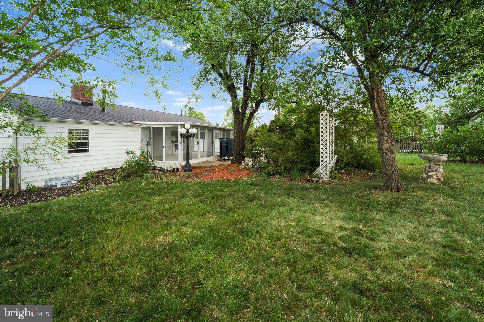 6423 Cabell Court Springfield, VA 22150 - Photo 53 of 58 a view of a house with backyard and sitting area