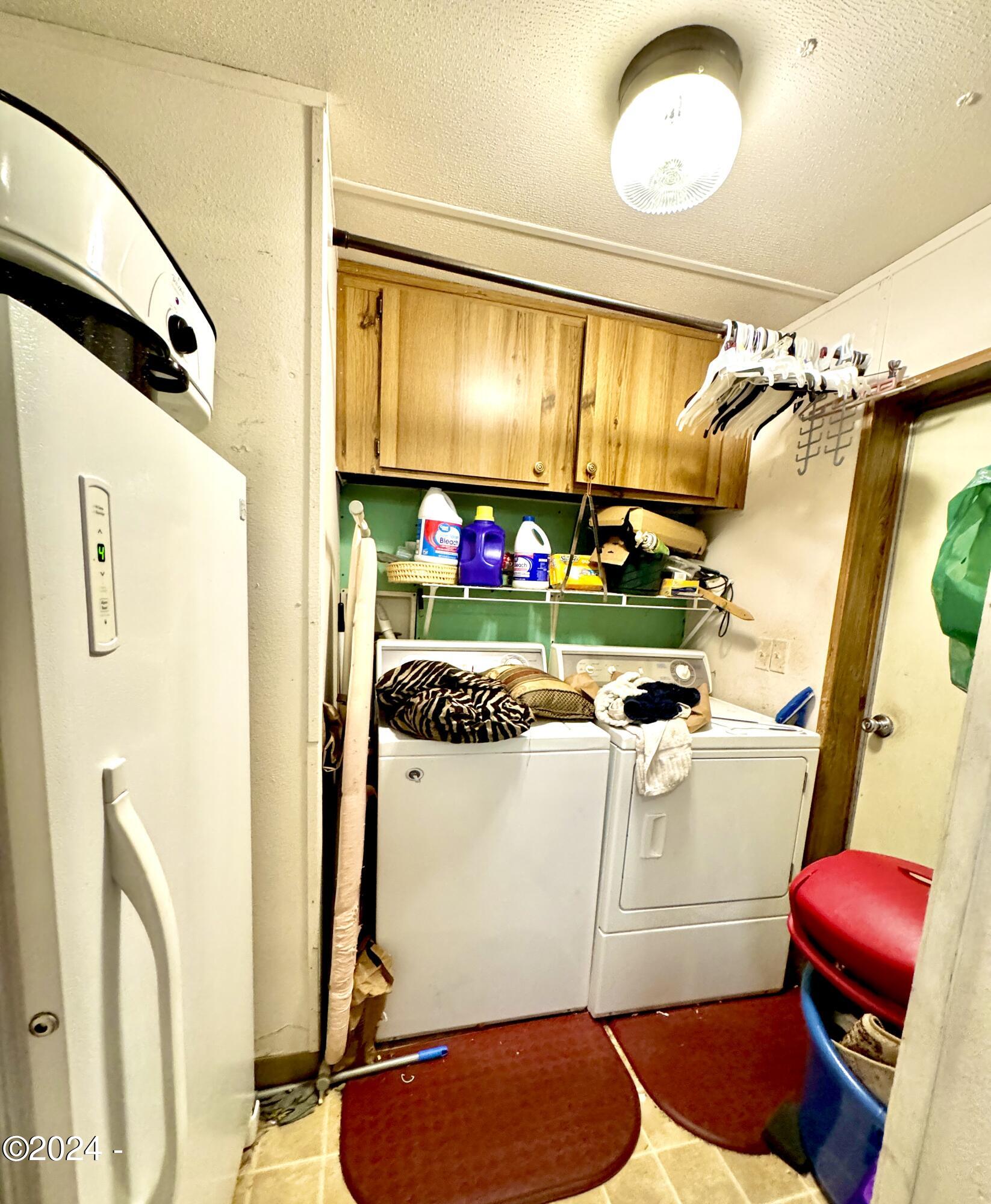 724 Southwest Ferry Avenue, Unit 73 Siletz, OR 97380 - Photo 19 of 24 Pantry/W/D