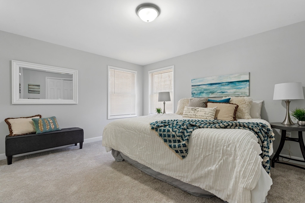 41 Casey Road Spencer, MA 01562 - Photo 21 of 39 a bedroom with bed and window