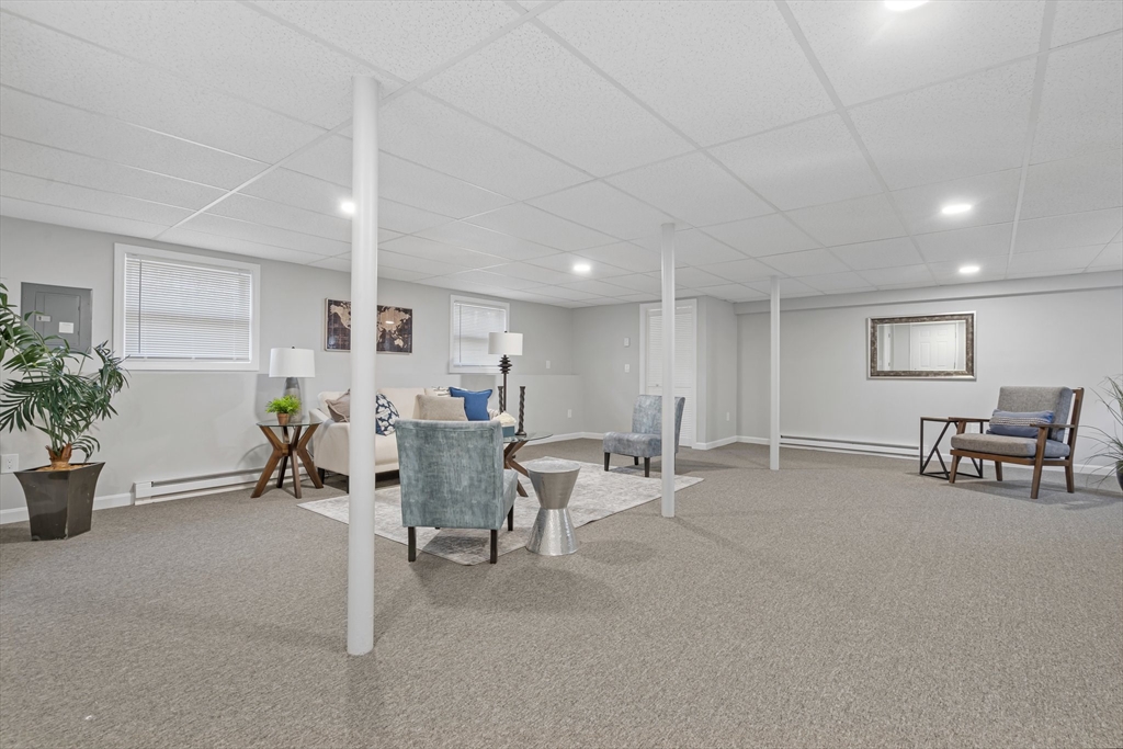 41 Casey Road Spencer, MA 01562 - Photo 25 of 39 a living room with furniture and potted plant